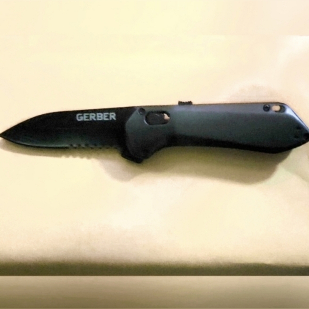 Gerber Gear Highbrow Compact, serrated spring assisted EDC.